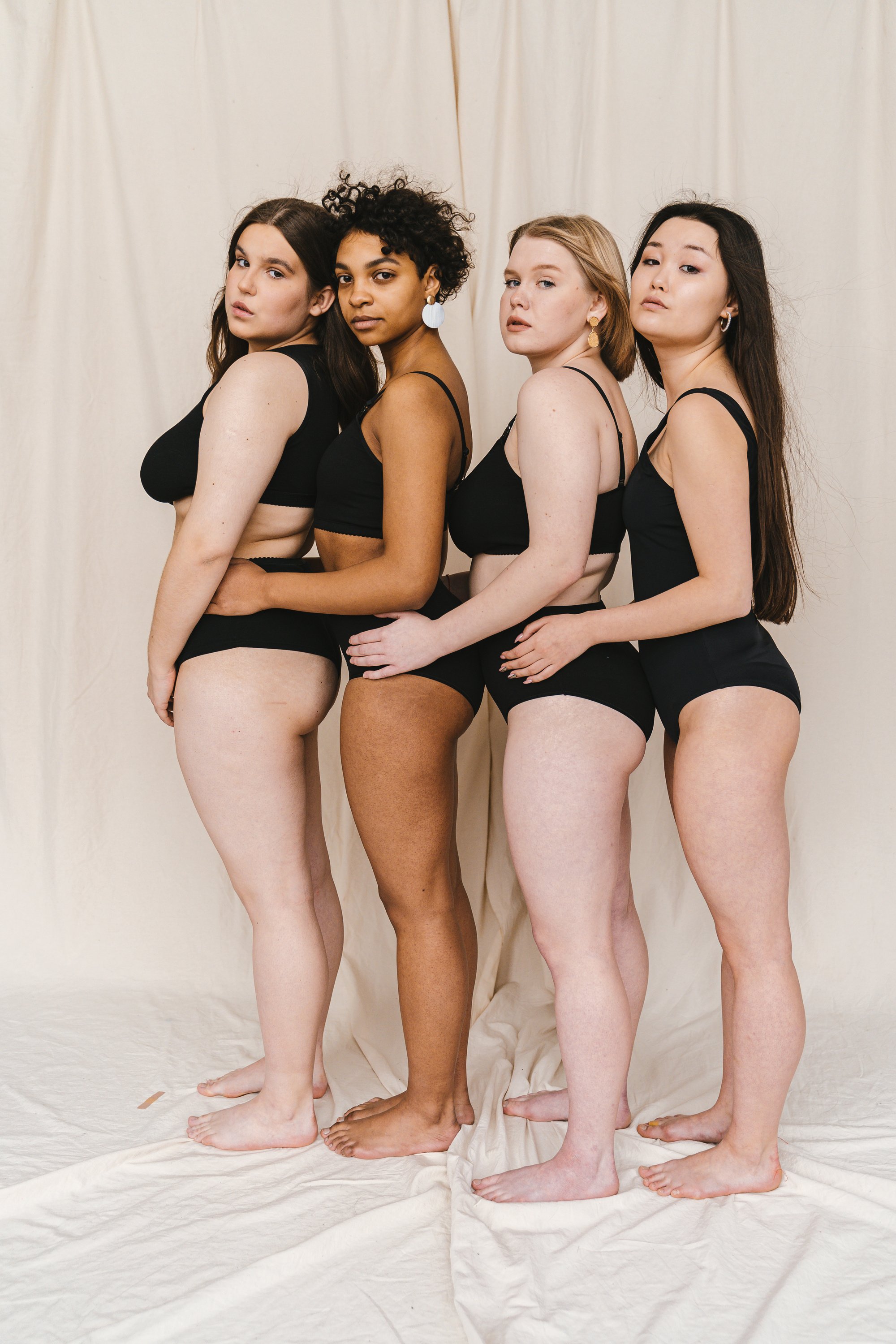 Four Women Posing in Underwear